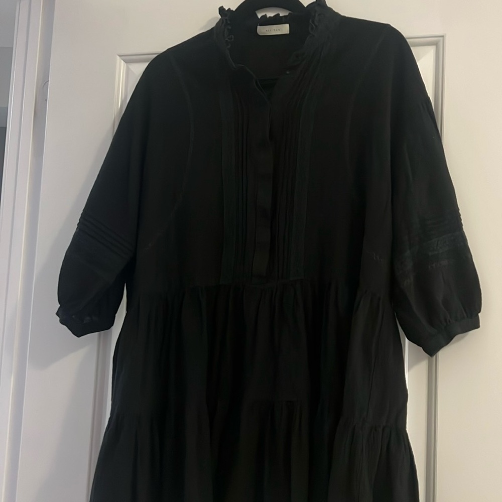 All row light weight cotton dress . Three quarter sleeve